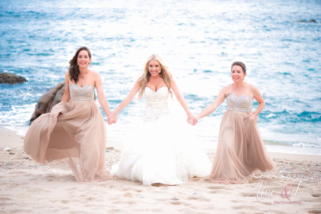 These bridesmaids dresses are a perfect compliment to the wedding dress soft and flowing! bride and bridesmaids on beach