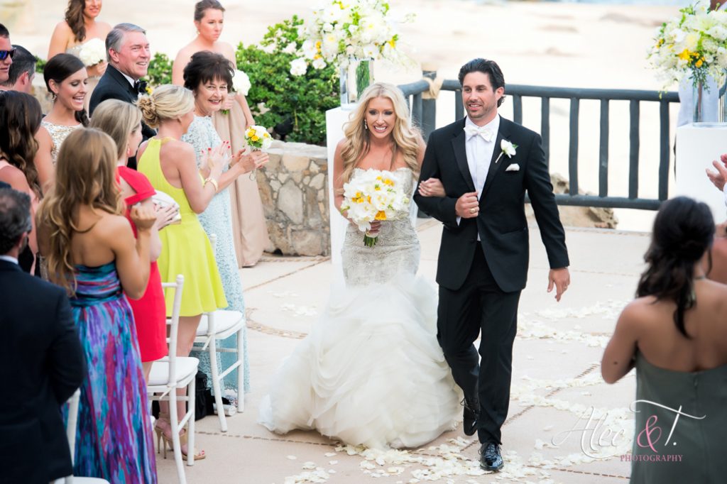 I love the choice of brides bouquet with this dress, amazing and done by be that bride! bride walking down the aisle after her ceremony
