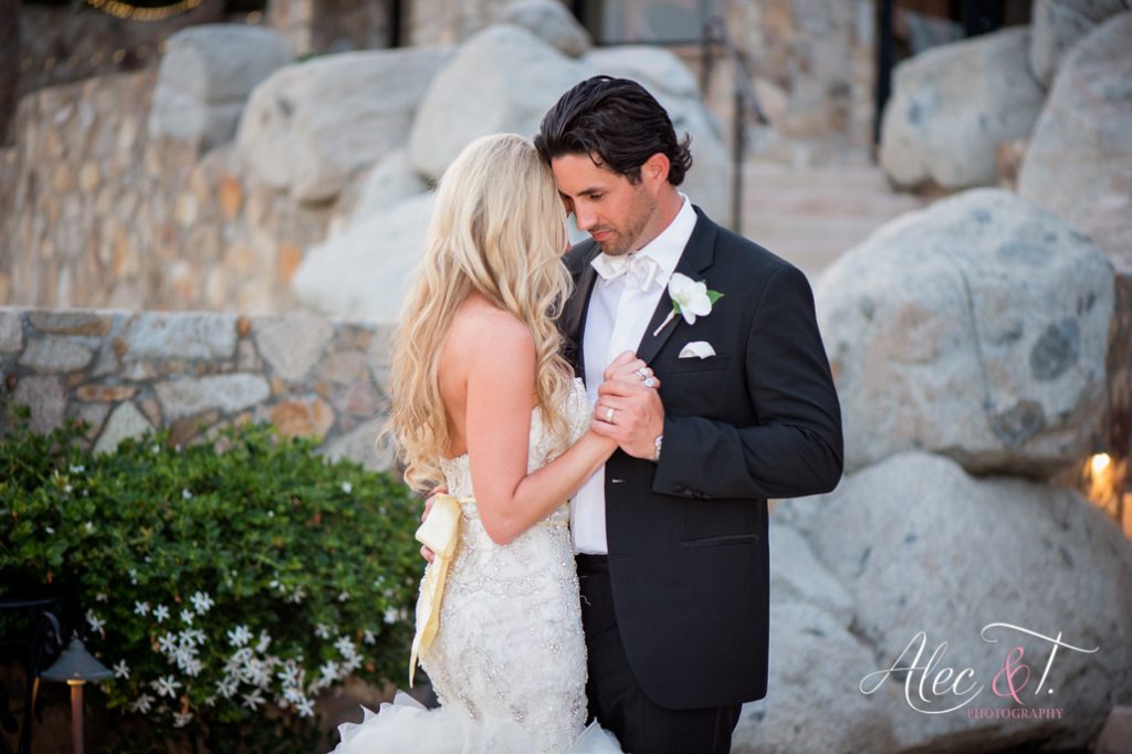 A stolen moment captured beautifully by Alec&T Photography after the wedding ceremony at Esperanza Resort a moment between the bride and groom after the ceremony