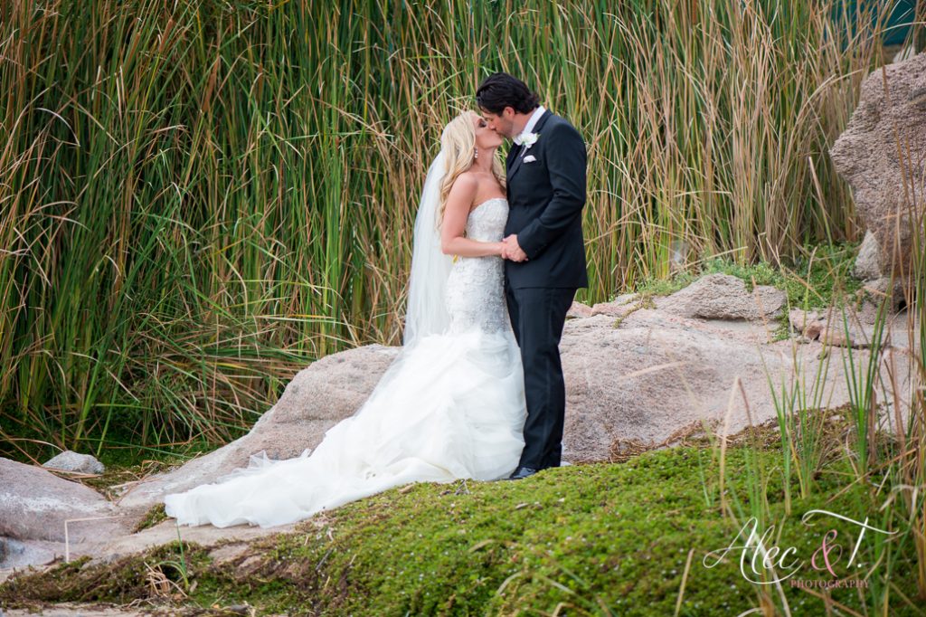 I so love this picture of Tracy and John the backdrop is amazing a picture of tracy and john kissing after ceremony