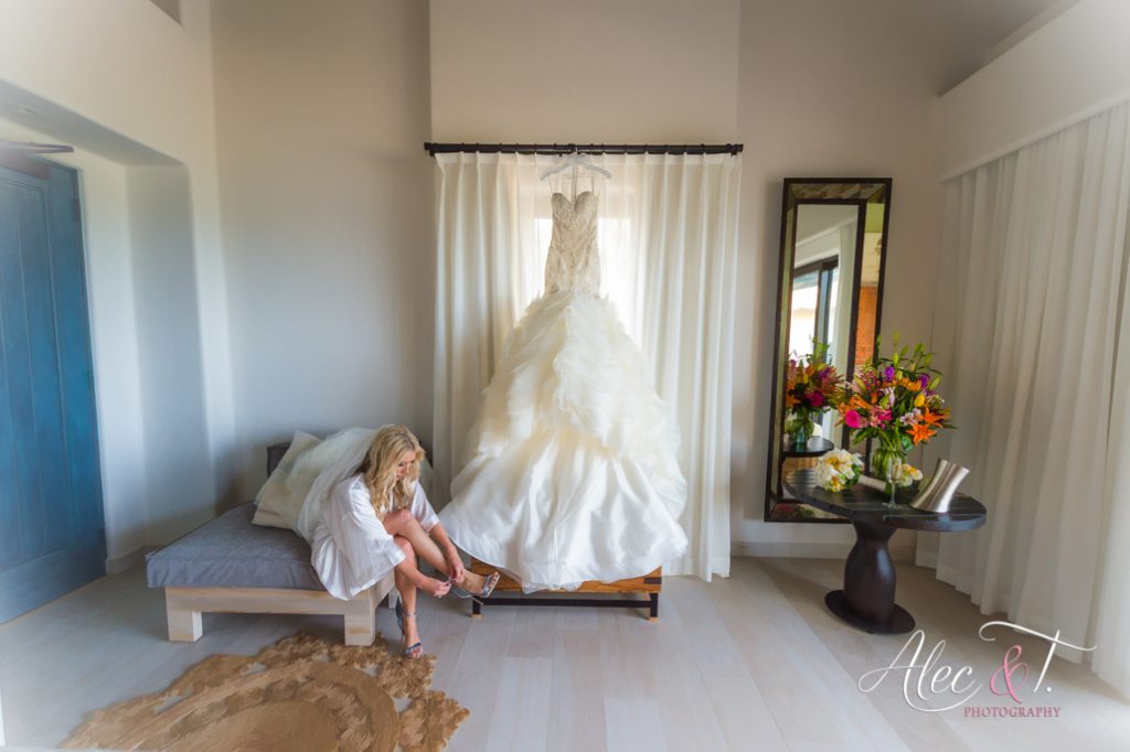 One of the most beautiful wedding dresses ever in pre set up picture by Alec&T photography bride getting ready for her ceremony at Esperanza Resort