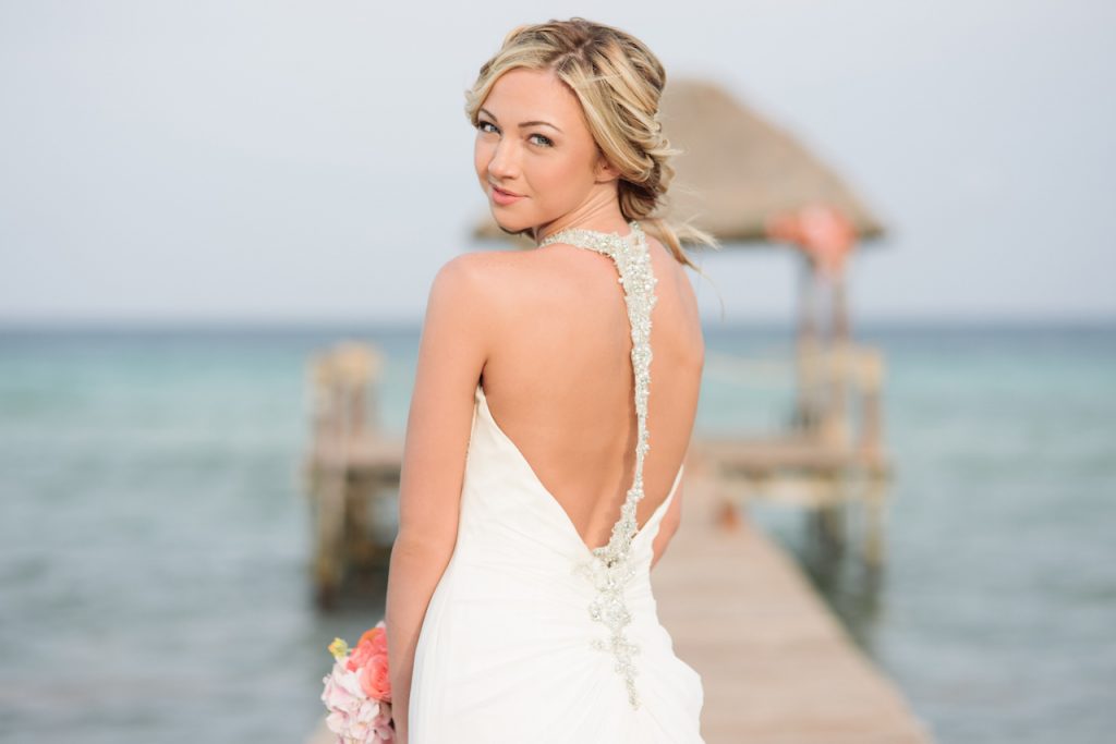 I love the softness of this beautiful wedding photography perfectly set against the backdrop of the Caribbean sea! 1 softness of the bride in this photo