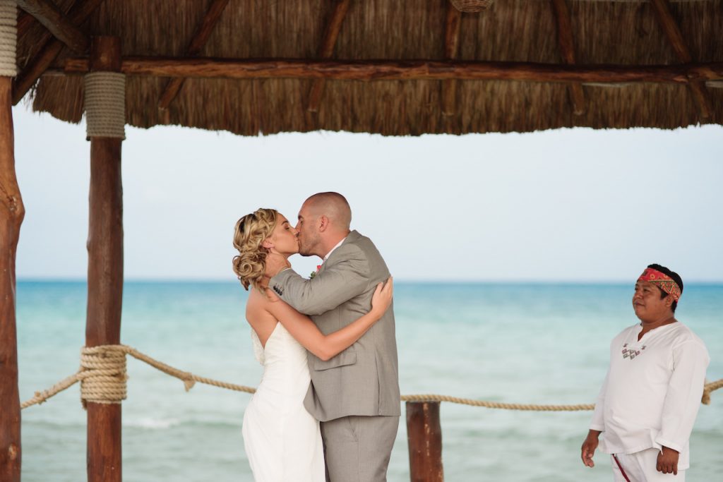 We all wait for the ceremony kiss. It's the best part of the ceremony! Riviera Maya Weddings 14ceremony kiss