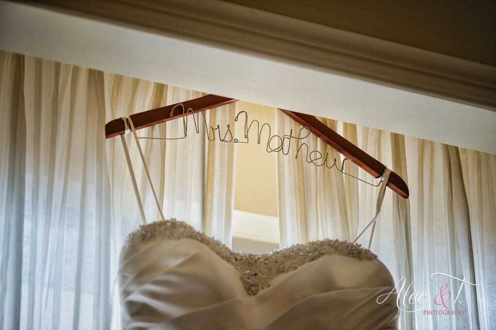 brides dress on hanger in wedding picture