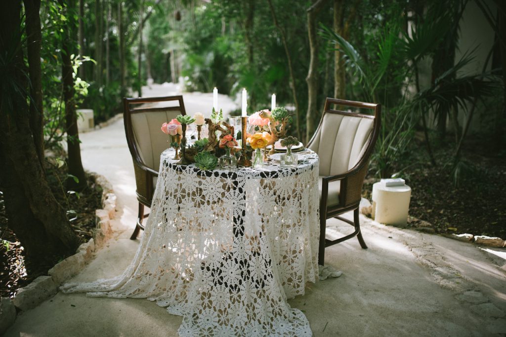 The hand-crafted lace really adds a delicate touch to this gorgeous table set up. Mexico wedding receptions 8 hand crafted lace