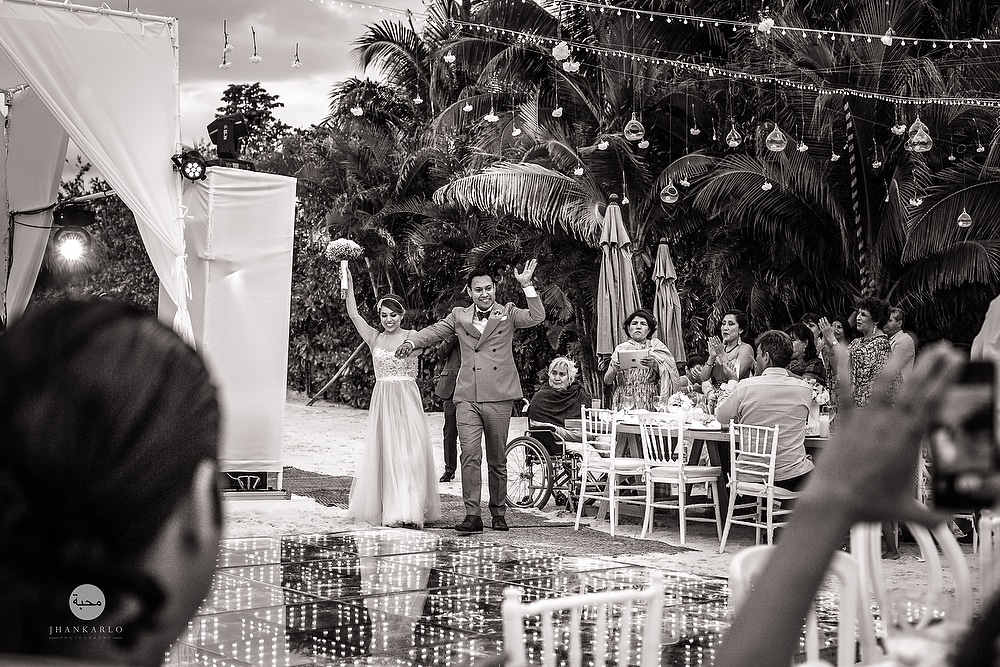  couple leaving the ceremony on their wedding day