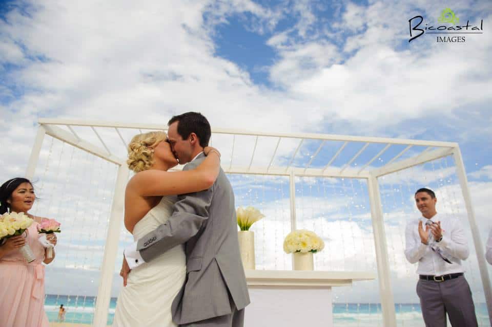 couple kissing after their wedding ceremony