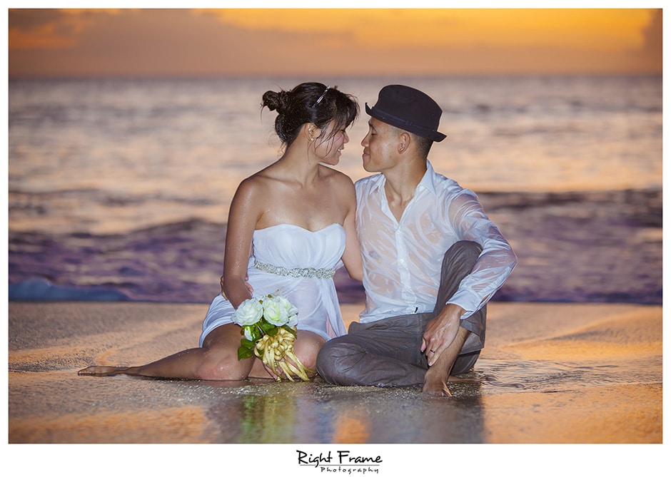  couple on the beach at sunset 