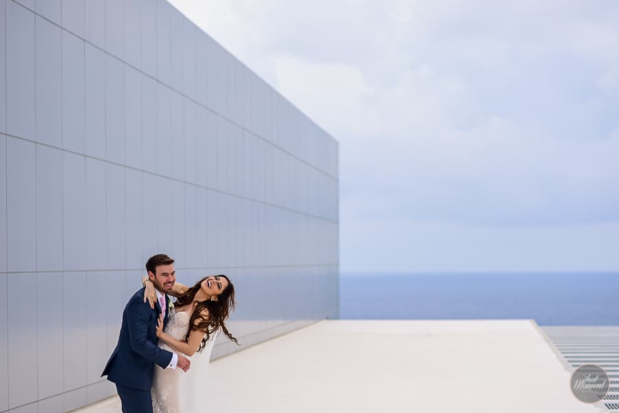 Wedding couple sharing a moment of fun 