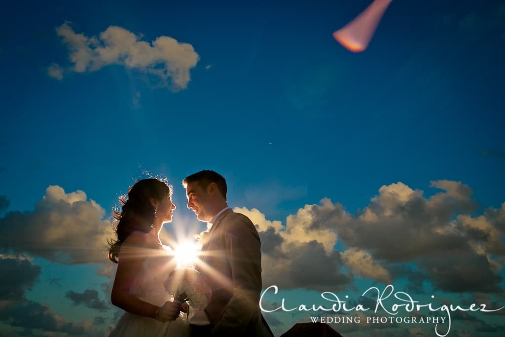 couple at sunset with sun 