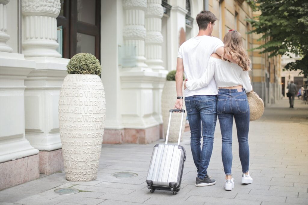 Couple at airport with luggage