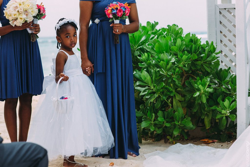 Adorable flower girl before ceremony 