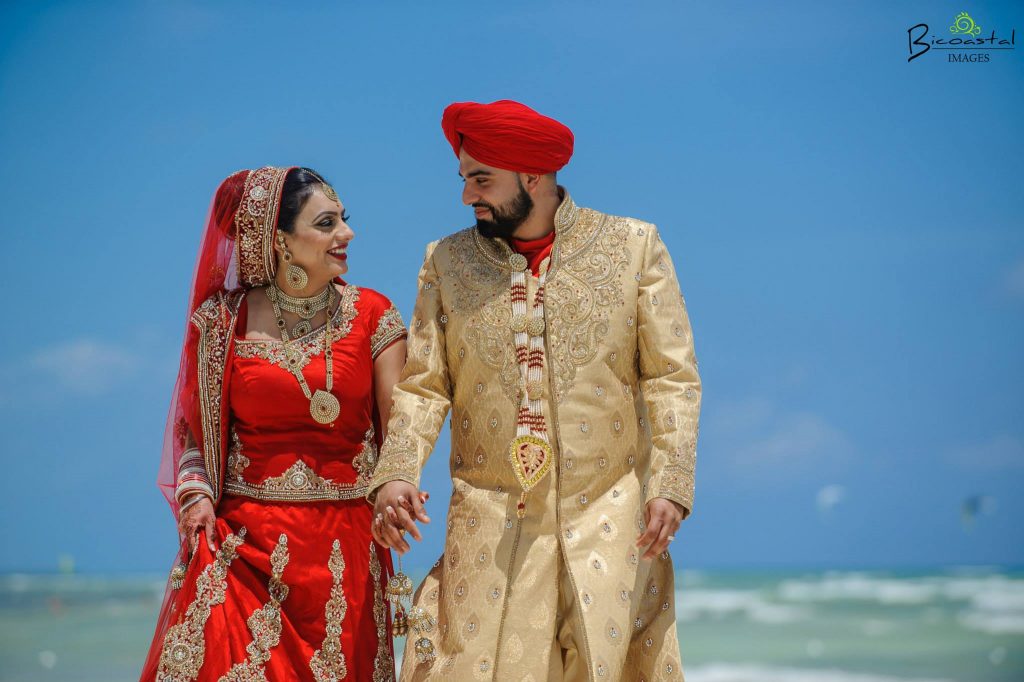  wedding couple on the beach for their destination wedding 