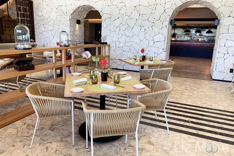 Luna Restaurant With brown return seating and tableware glasses and white rock background