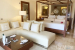 Excellence-Playa-Mujeres-bedroom-lounge-couch