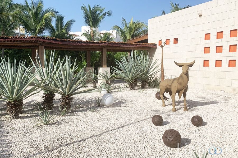Art deco animal set up amongst the cacti And gravel