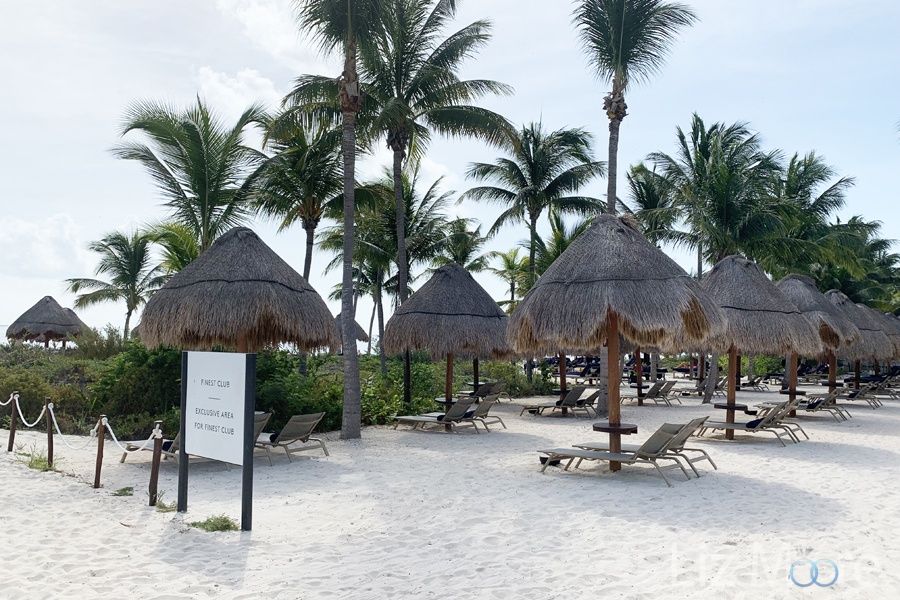 club section beach cabanas Along the white sandy beach by the ocean