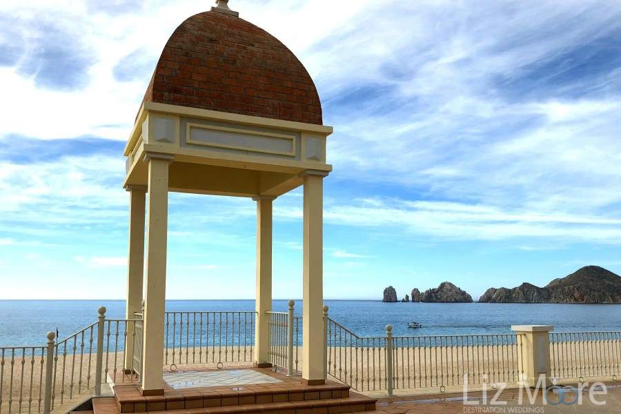 main wedding gazebo which is located beside the beach and the ocean where you can also see the Los Cabos arches
