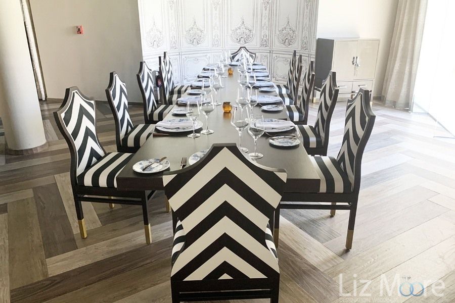 French Restaurant With black and white striped chairs and Wood Parka flooring
